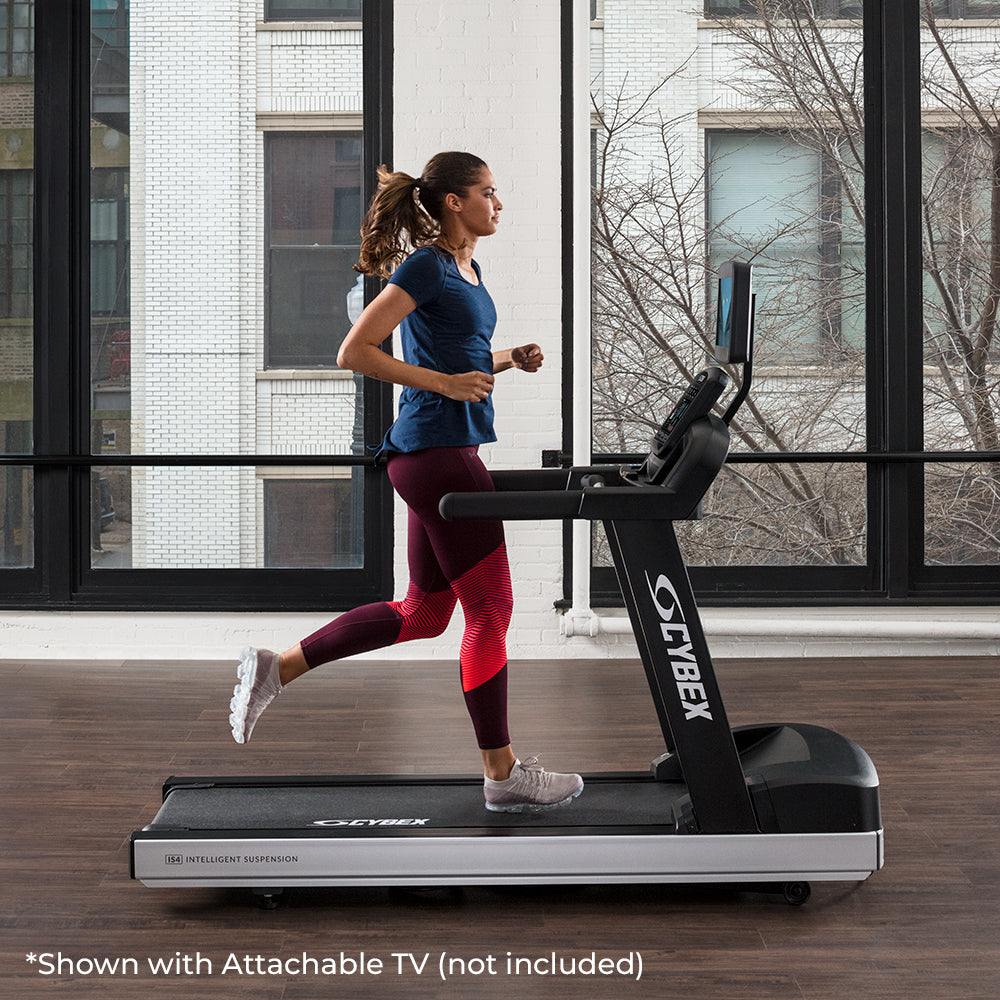 Runner on Cybex V Series Treadmill - shown with Black Frame and Attachable TV (not included)