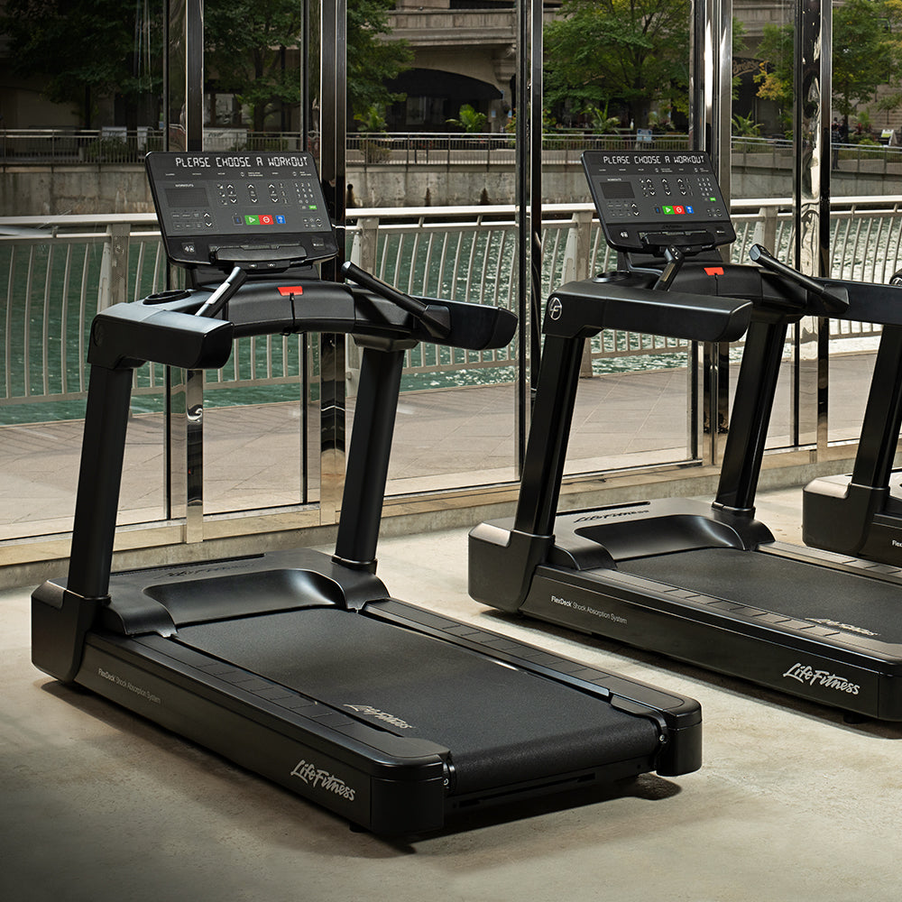 Club Series+ Treadmills at gym in city, shown with SL console