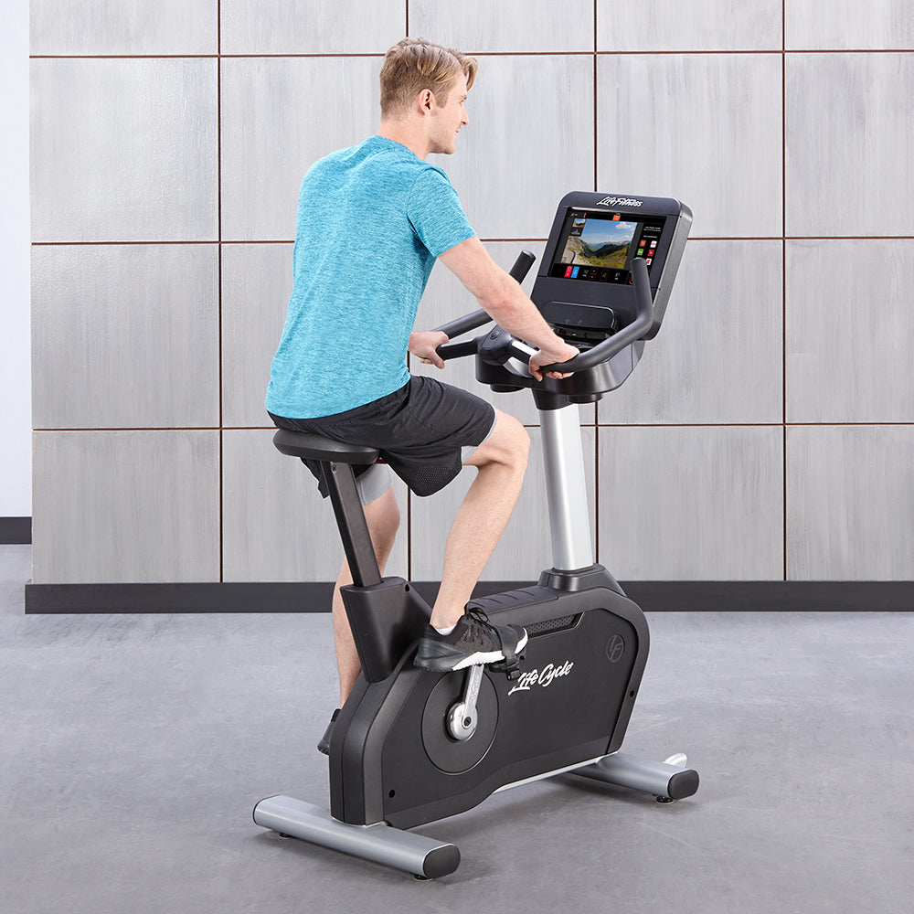 Club Series+ Upright Bike with exerciser perdaling