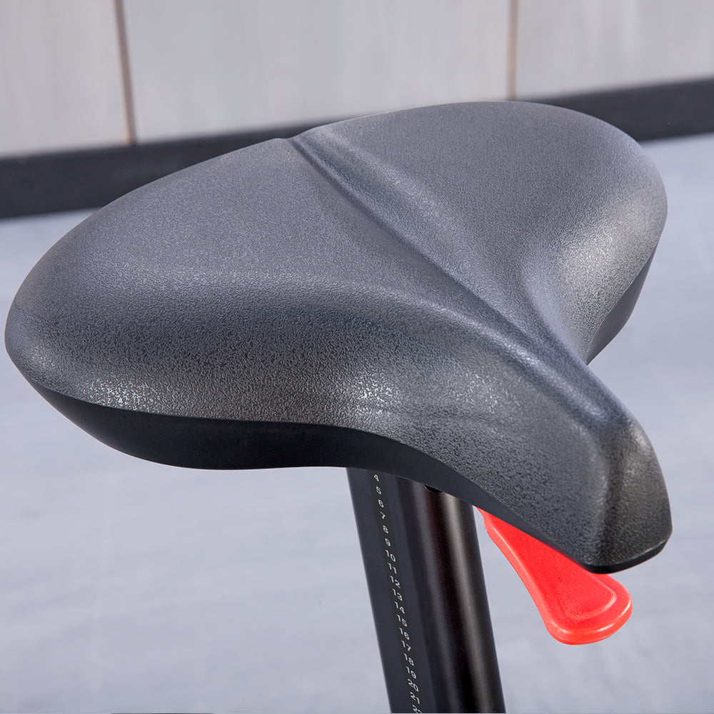 Comfortable seat on Club Series+ Upright Bike