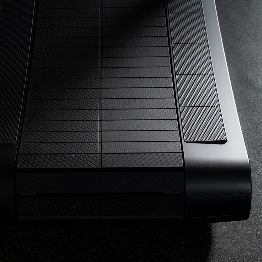 HD Tread slatted, curved running deck closeup on self-powered treadmill