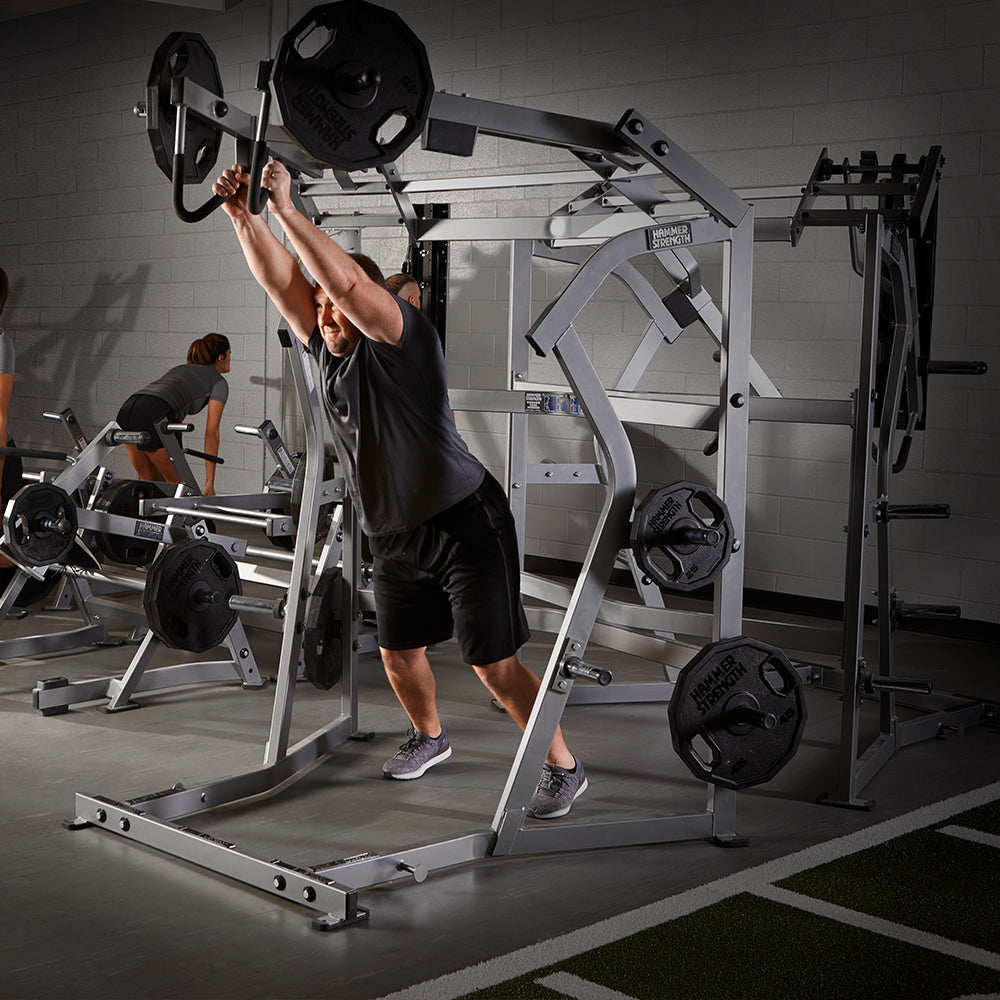 Male exerciser using Hammer Strength Jammer